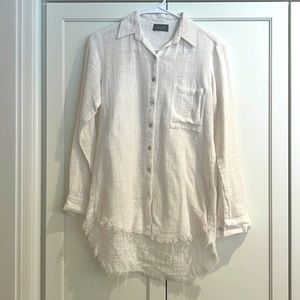 Figwood white blouse with unfinished edge.